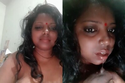 Very-sexy-Tamil-mallu-xxx-bhabi-hindi-sucking-her-boobs-mms.jpg